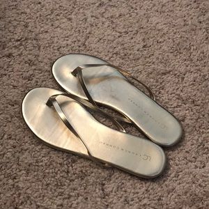 Gold flip flops